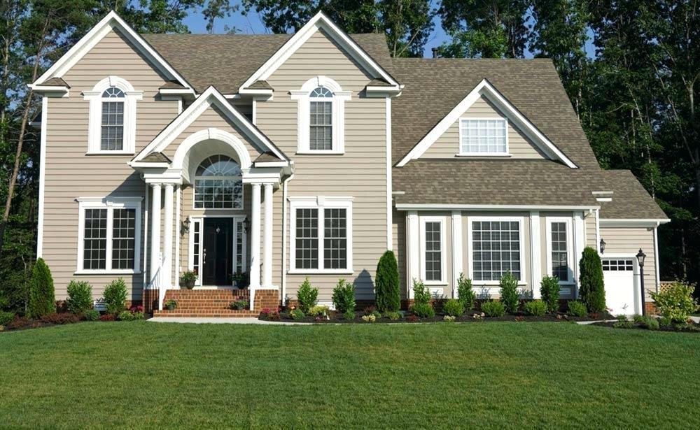 A fresh coated house with white and light grey paint.